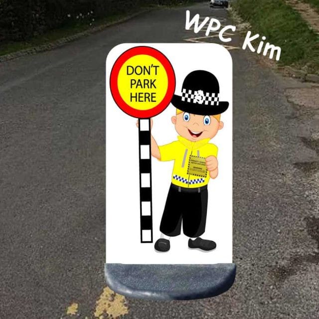 No parking school sign police lady
