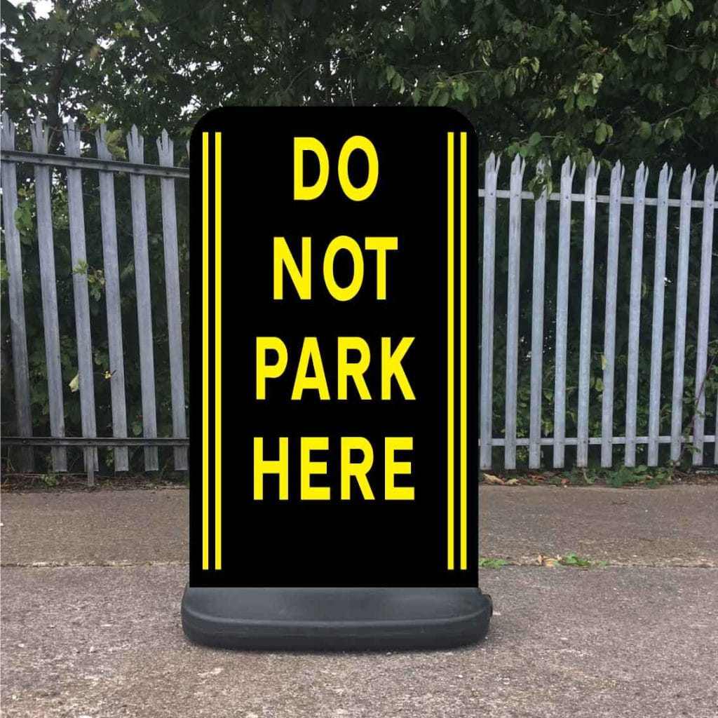 Do not park here school sign Yellow lines