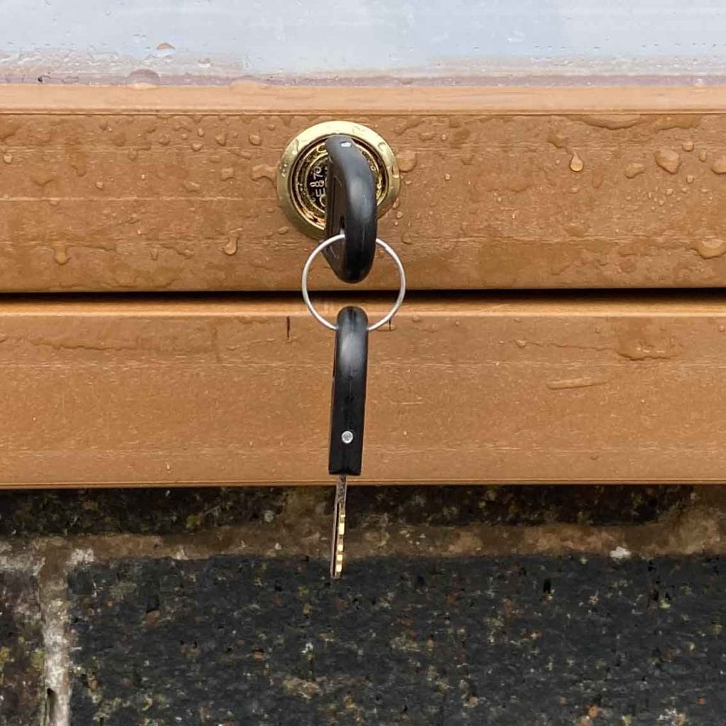 Recycled plastic wood affect notice board lock